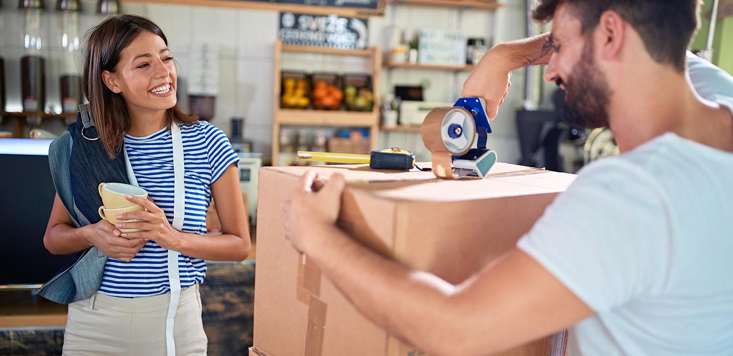 Two people talking in a store.