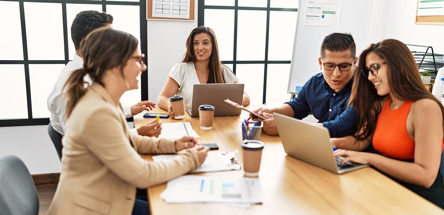 A group of business professionals in a meeting.