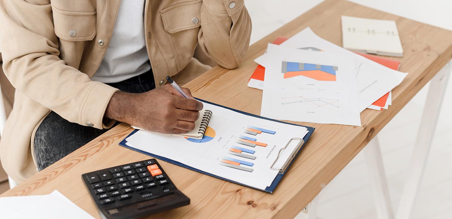 A person looking at a graph.