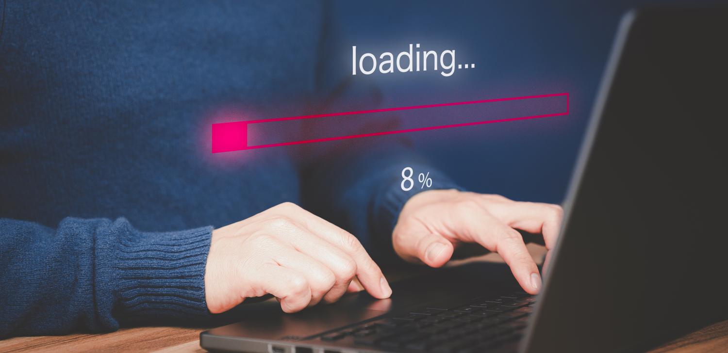 website loading graphic with person on laptop