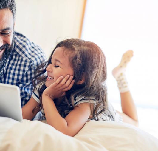 Father and daughter using tablet Thumbnail